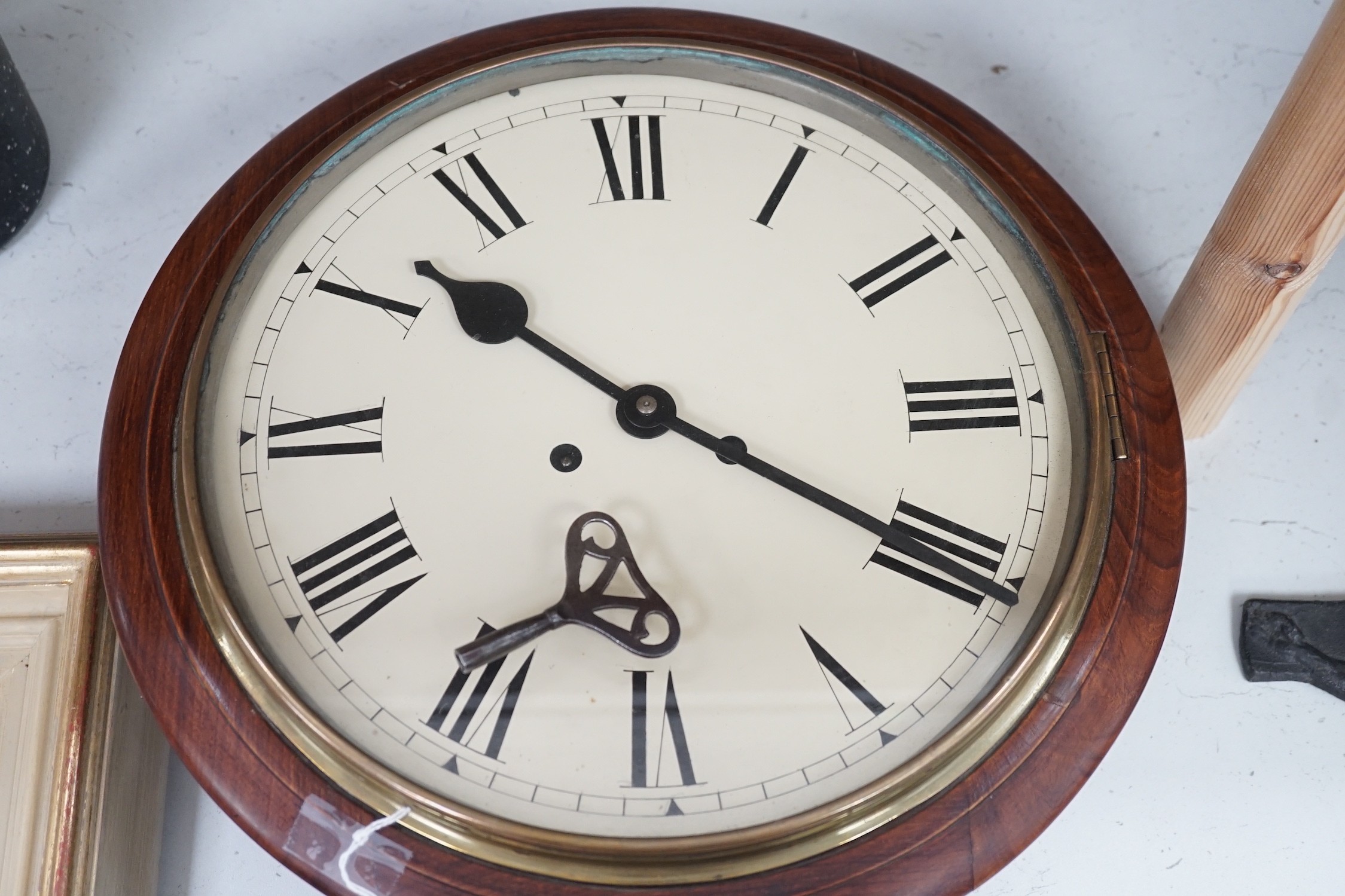 A teak cased wall clock, 38cms diameter